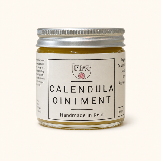 Calendula Ointment — clean product shot on warm cream