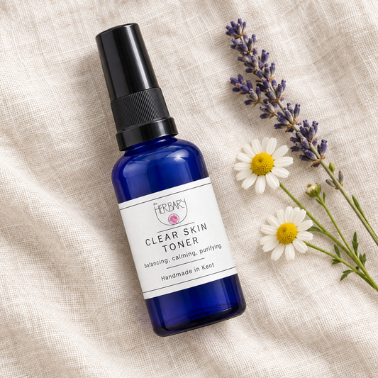 Clear Skin Toner flat lay with lavender and chamomile — The Herbary