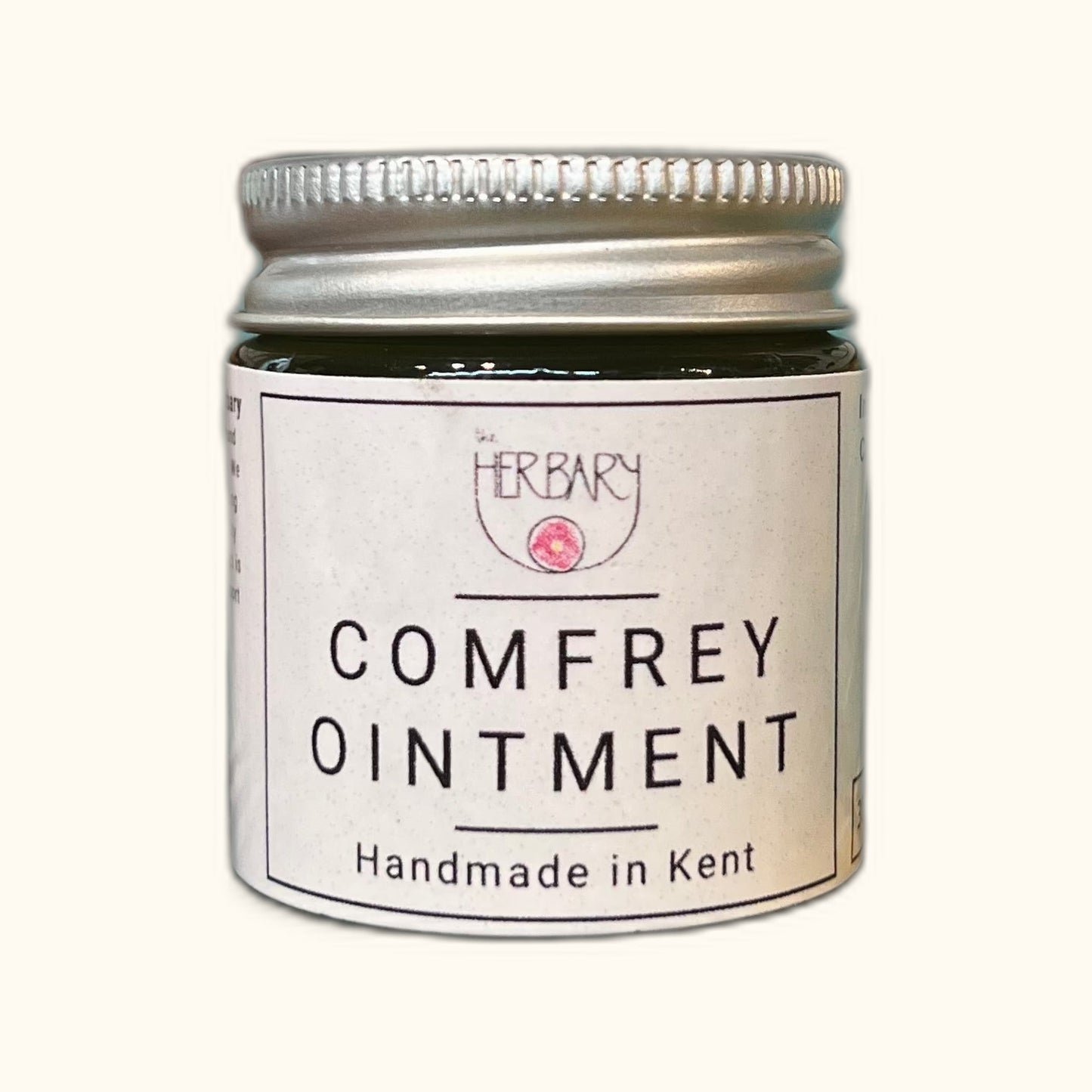 Comfrey Ointment on clear cream background