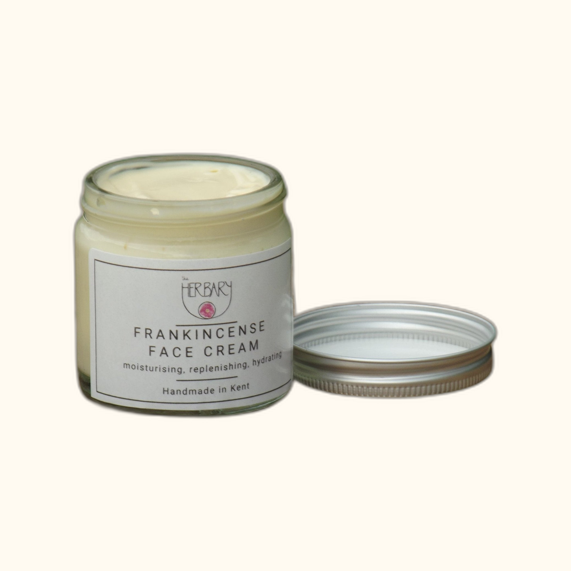 Frankincense Face Cream on clear cream background