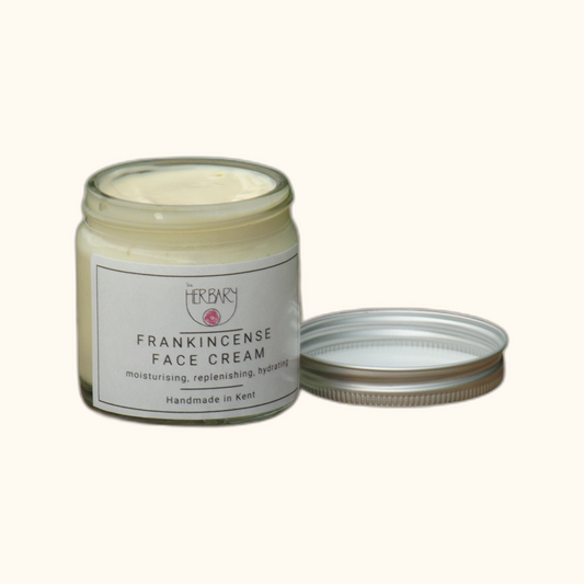 Frankincense Face Cream on clear cream background