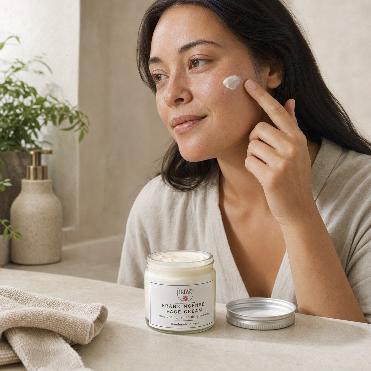 Applying Frankincense Face Cream as a moisturising skincare step