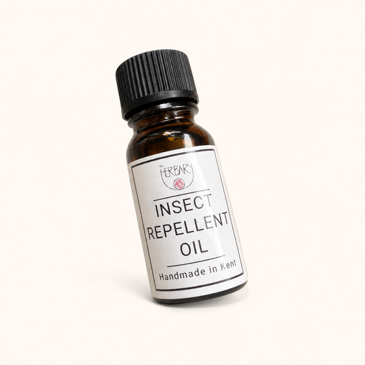 Insect Repellant Oil 10ml — clean product shot on warm cream