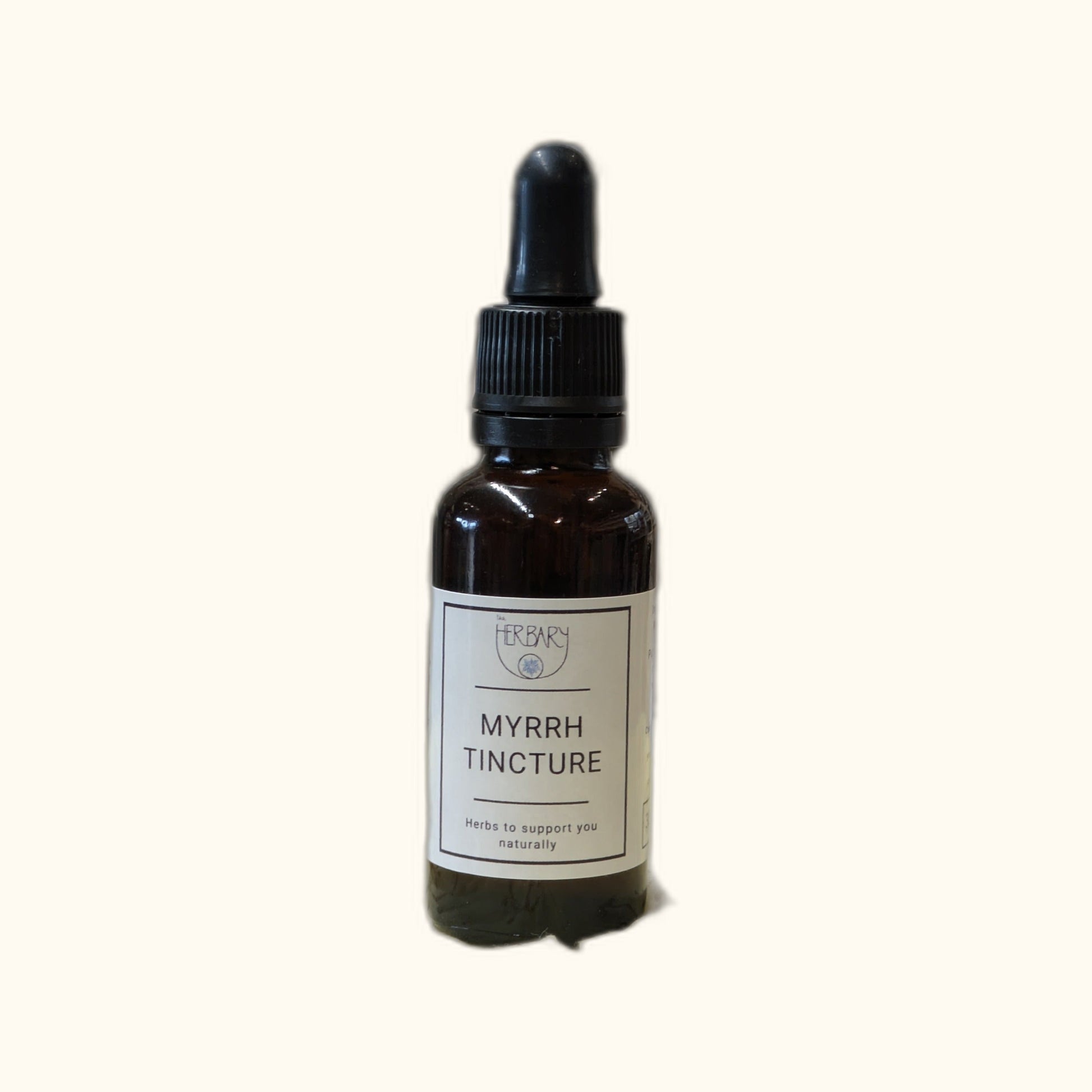 Myrrh Tincture on clear cream background