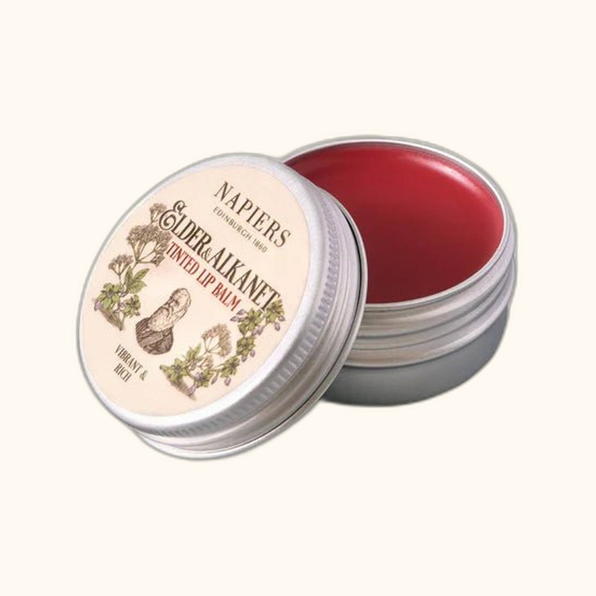 Napiers Elder and Alkanet Lip Tint on clear cream background