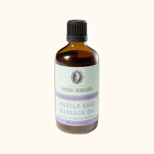 Napiers Muscle Ease Massage Oil on clear cream background