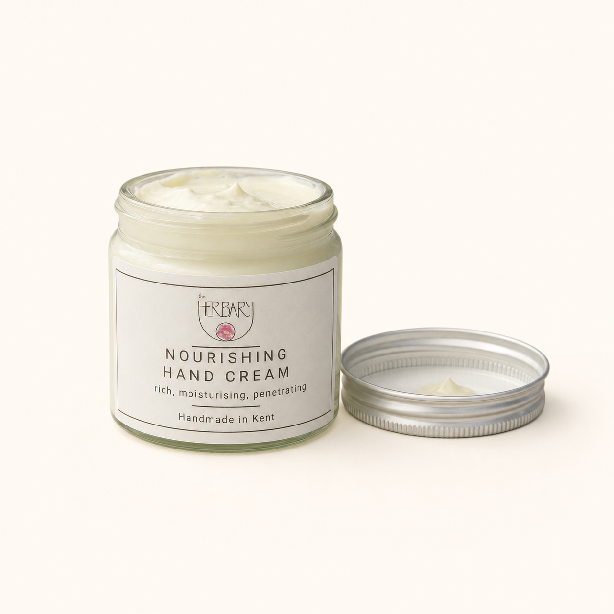 Nourish Hand Cream — clean product shot on warm cream