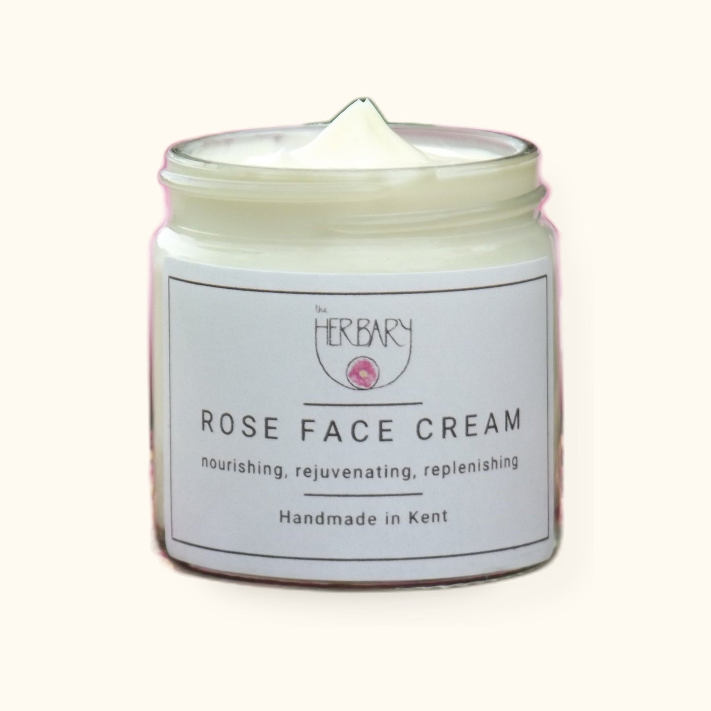 Rose Face Cream on cream background with shadow