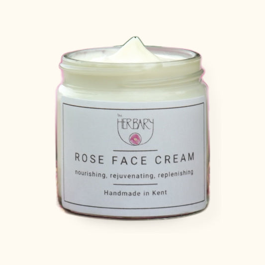 Rose Face Cream on cream background with shadow
