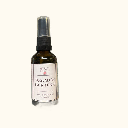 Rosemary Hair Tonic on clear cream background