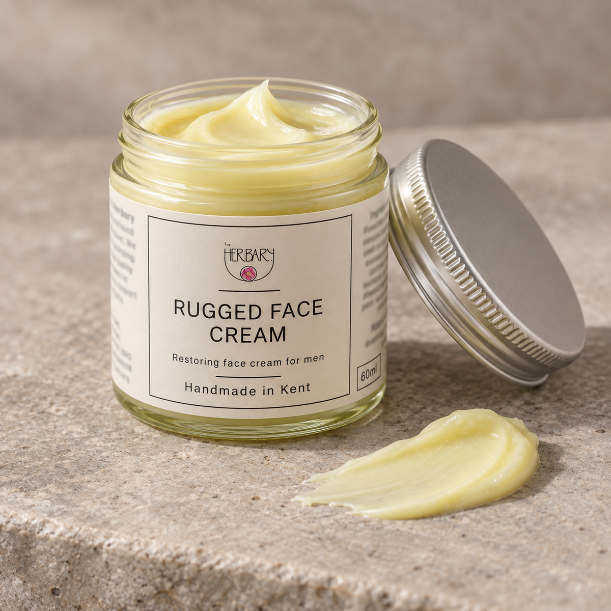 Open Rugged Face Cream jar with a cream texture swatch — The Herbary