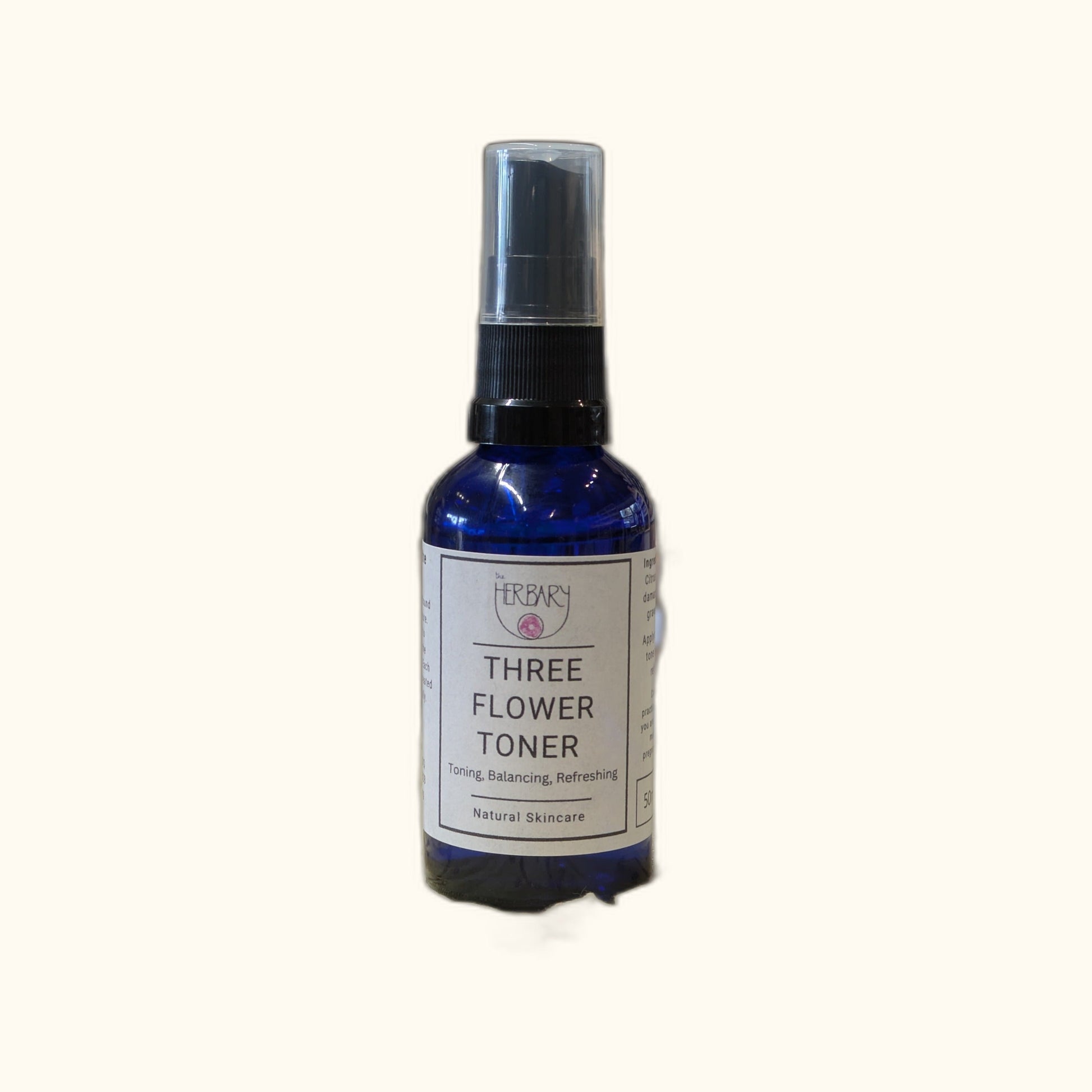 Three Flower Toner on clear cream background